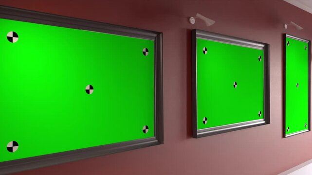 Close Up Green Screen Frames on Red Gallery Wall
