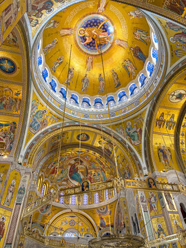 Golden mosaic interior of Saint Sava Temple in Belgrade, Serbia.