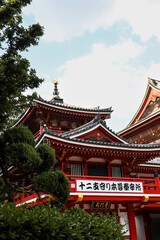 Fototapeta premium Serene Buddhist temple in a traditional Japanese setting