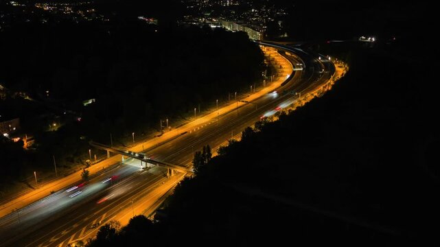 Aerial Hyperlapse of Highway Traffic at Night in Switzerland