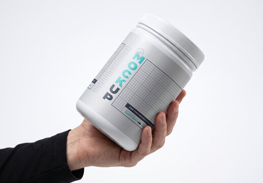 Hand Holding Supplement Container Jar Label Design Mockup
