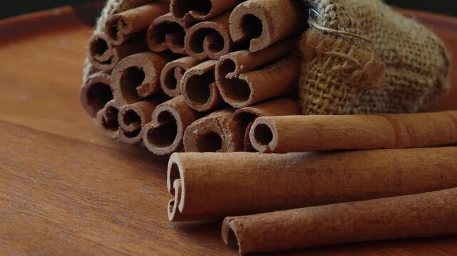 Burlap sacks filled with aromatic cinnamon sticks 