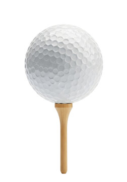 White golf ball on a tee ready for a shot