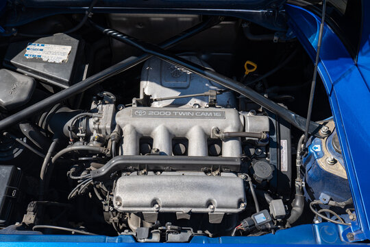 Kemptthal, Zurich, Switzerland, September 6, 2026. Top view of a Toyota 2000 Twin Cam 16 engine bay in a blue sports car.