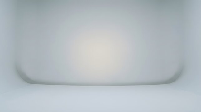 Minimalist white studio interior with soft ambient lighting and curved walls