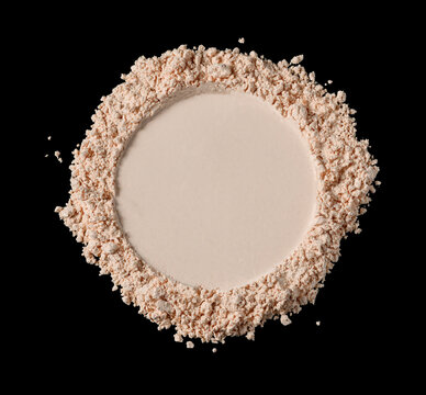 Makeup foundation face powder round swatch on textured powder background and black backdrop