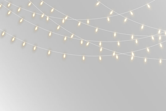 Glowing fairy light strings with sparkling particles. Elegant festive garland for wedding, holiday and magical celebration background