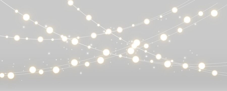 Hanging warm fairy lights with glowing bulbs and copy space. Decorative string garland for holiday banners and celebration design