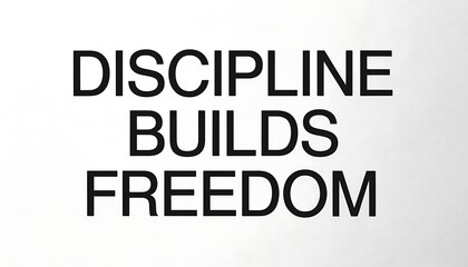 Obraz premium Discipline Builds Freedom Text Graphic in Bold Black Typography Keywords: discipline builds freedom, motivational quote, typography, lettering, text, message, inspiration, self-discipline, freedom