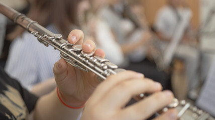 Musician Playing Silver Traverse Flute Close Up Detail © Сергей Иванкин