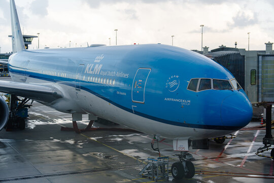 August 21, 2026, Amsterdam, Netherlands - KLM Royal Dutch Airlines Boeing 777 aircraft parked at Schiphol Airport gate