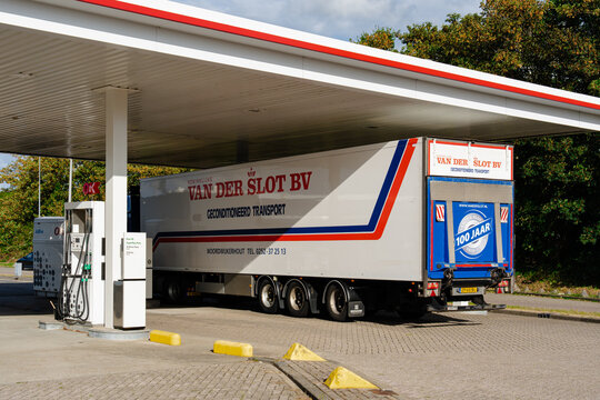 August 21, 2026, Amsterdam, Netherlands - Van der Slot BV refrigerated transport truck at a gas station