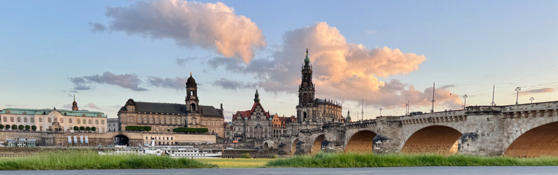 Landscape of historical buildings along the river at sunset in Dresden, Germany