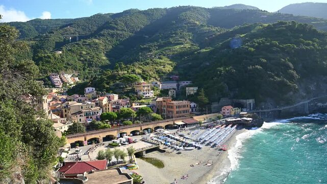 Seaside village nestled along mediterranean rocky coastline. Monterosso al Mare, Italy