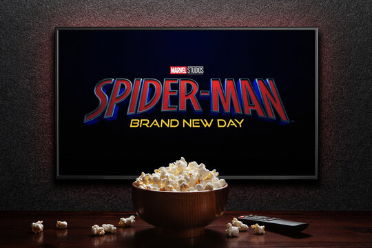 TV screen playing Spider-Man Brand New Day trailer or movie. TV with remote control and popcorn bowl. Astana, Kazakhstan - July 31, 2026.