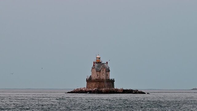 Fishers Island, New York, United States - Lit Beacon at Historic Race Rock Lighthouse in Long Island Sound
