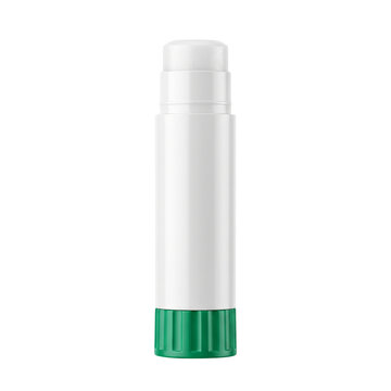 White glue stick with green cap, isolated on black background, studio shot
