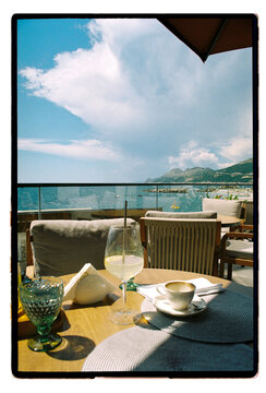 Coffee and wine on a seaside terrace overlooking the Adriatic