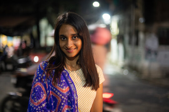 Portrait of a young Indian woman at night
