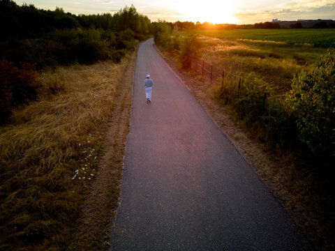 Walking Path During Sunset in a Rural Area