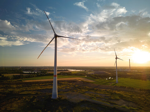 Wind Turbines Stand Tall Against the Sunset Sky
