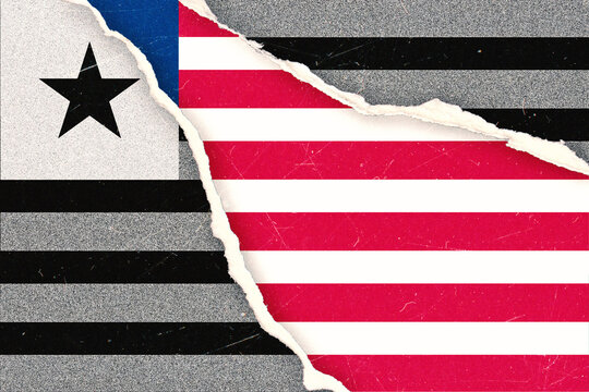Flags of the United States and a Monochrome Liberian Flag Design Torn Apart Illustrating Complex International Relations