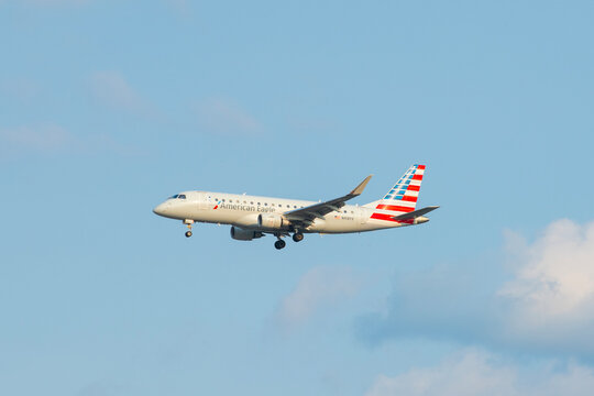 American Airlines American Eagle ERJ-175 N418YX landing on Boston Logan International Airport (BOS), Boston, Massachusetts MA, USA. 