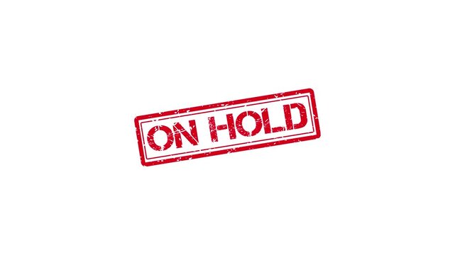 Red "on hold" rubber stamp effect animation on white background, for business status, updates ink stamp