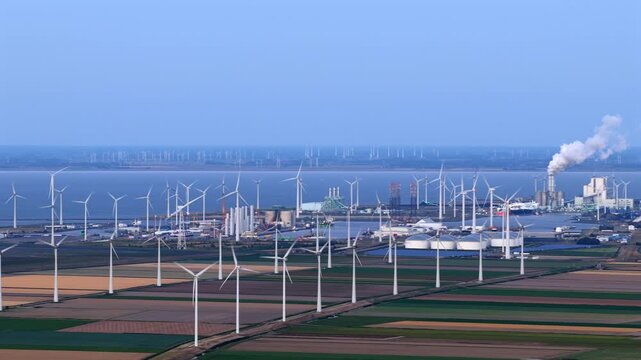 Aerial view of wind turbines in the industrial port of eemshaven