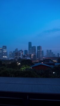 Vertical video -  Timelapse of Jakarta skylines in the morning during sunrise