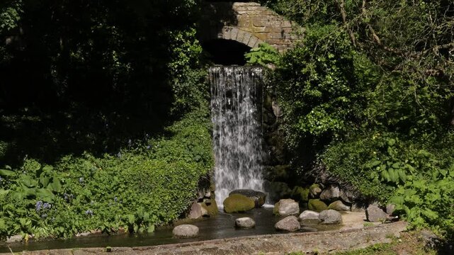 Scenic waterfall inside Frederiksberg Gardens (Frederiksberg Have), Copenhagen