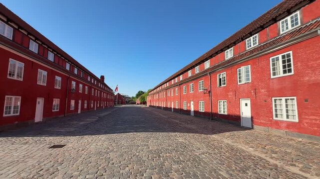 Red military barracks buildings at Kastellet citadel in Copenhagen, Denmark