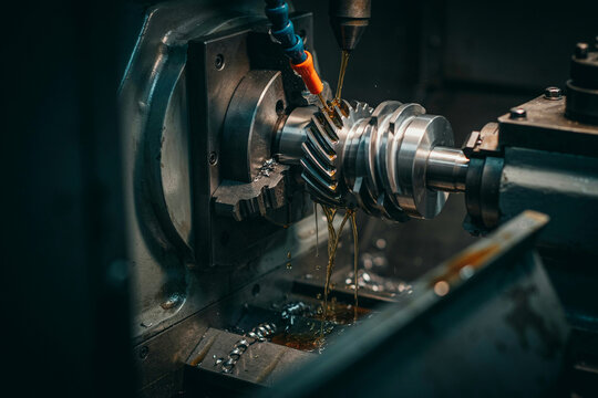 Macro of gear hobbing machine cutting steel worm gear with coolant