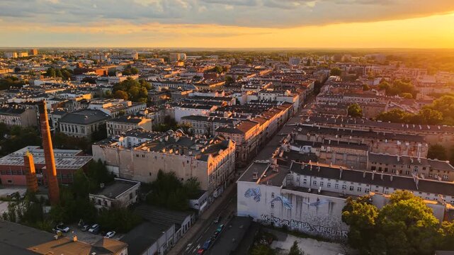 Drone view of Lodz cityscape skyline at sunset, Poland