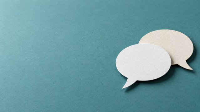 Two Blank Speech Bubbles on Teal Background with Copy Space