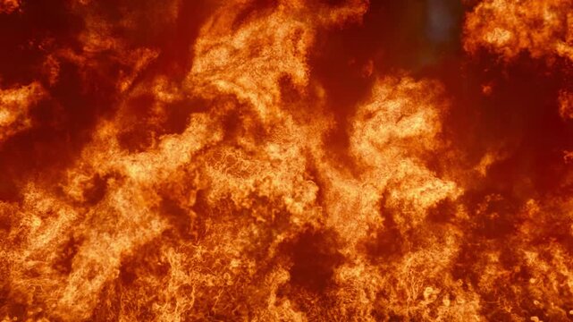 Abstract realistic burning firestorm background with dense orange flames and heavy realistic smoke on alpha channel