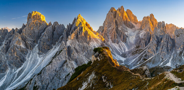 Sun drenched peaks of the Cadini di Misurina in the UNESCO world heritage site Dolomites in north Italy 