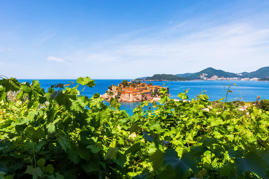 Old town on the island of Sveti Stefan is a famous landmark in Montenegro.