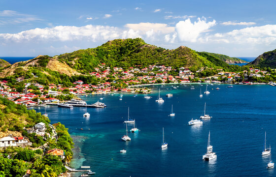 Scenic elevated view over the harbor, boats, and coastal town of Terre-de-Haut in Les Saintes, Guadeloupe, Caribbean France