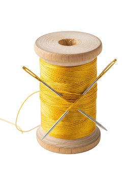 Yellow thread spool with orange sewing needles