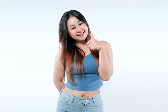 Asian Woman Giving Thumbs Up with Happy Expression