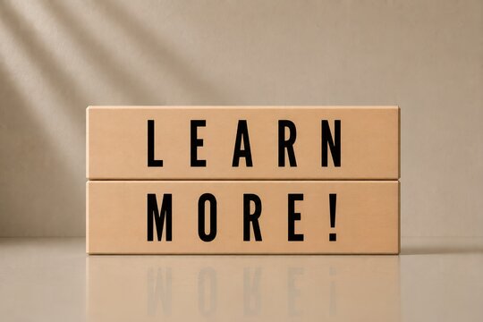Learn More Message on Wooden Blocks for Education, Information and Call to Action