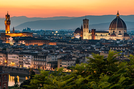 Sunset view of Florence, Italy, featuring the iconic Florence Cathedral (Duomo) and Palazzo Vecchio