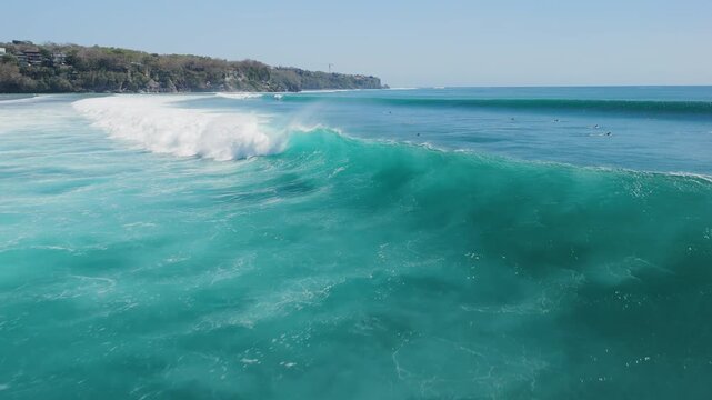 Above view with crashing surfing waves in ocean on Impossibles beach