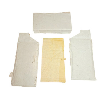 Four rectangular paper and cardboard cutouts in beige, white, and light brown colors arranged on a plain surface for craft and projects isolated on a transparent background