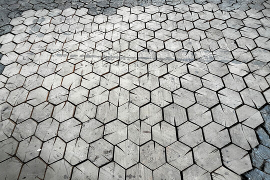 Wooden Hexagonal Blocks Tiled Floor. Hexagons Pattern in Diminishing Perspective. Abstract Natural Textured Background.      