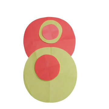 Two large circular paper cutouts with smaller inner circles in red and yellow colors arranged on a plain white background, for crafts isolated on a transparent background