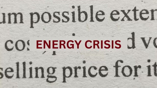 Energy crisis word above news or magazine media article texts. Stop motion animation loop. global fuel, oil and gas industry distribution or supply shortage problem concept.