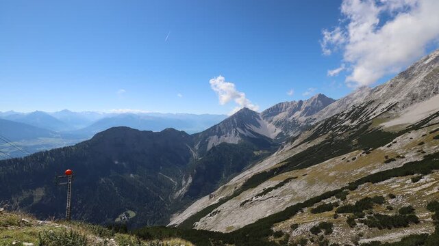 View of the Halltal valley and the peaks of the Tyrolean Alps in summer.