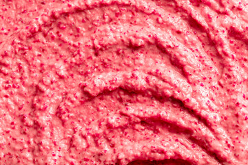 Obraz premium Fruit pink ice cream. Yogurt smoothie with fresh fruits and berries. Ice cream texture. Delicious sweet dessert close-up as background.